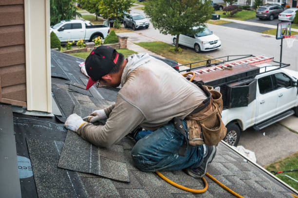 Professional Emergency Roof Repair technician working in Williamsfield, OH